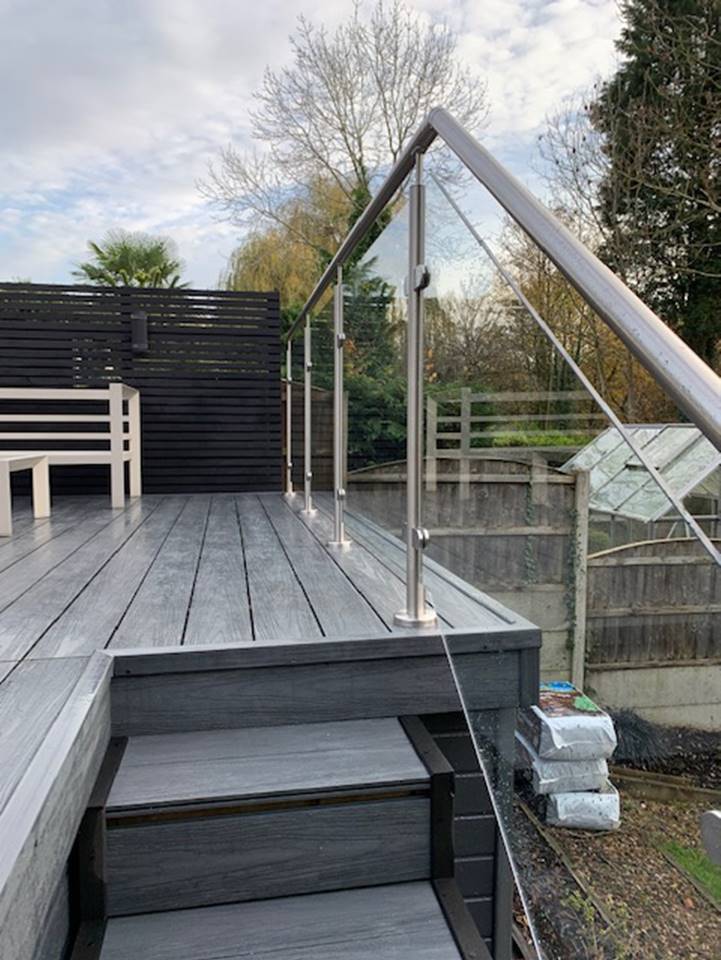 Glass balustrade with stainless handrail